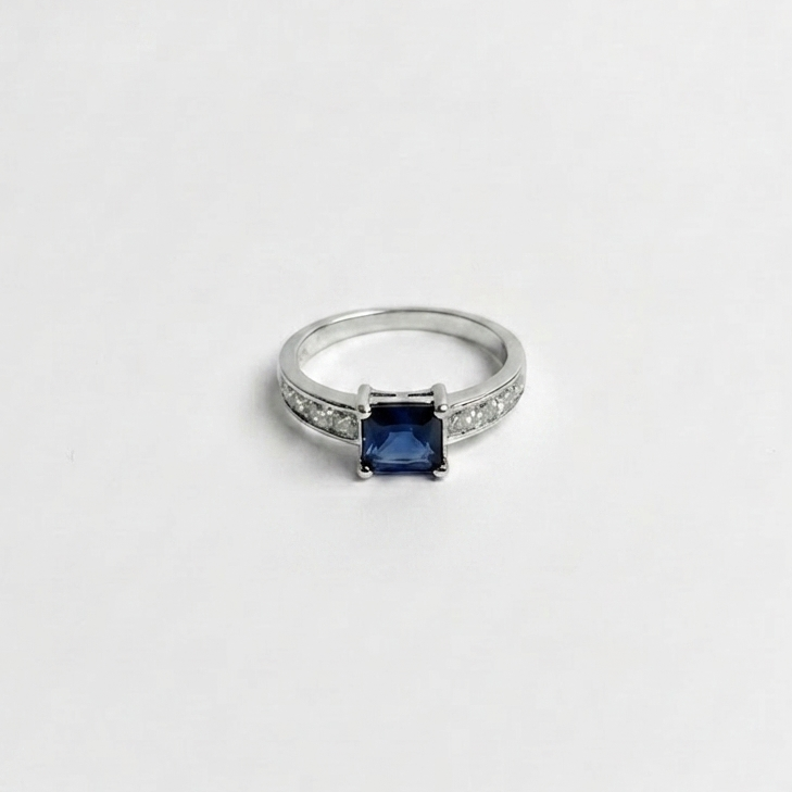Midnight Royal Sapphire Ring with Accented Halo Band