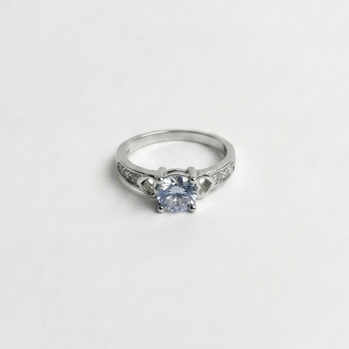 Heart-Accented Solitaire Ring with Radiant Round-Cut Crystal