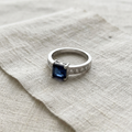 Midnight Royal Sapphire Ring with Accented Halo Band